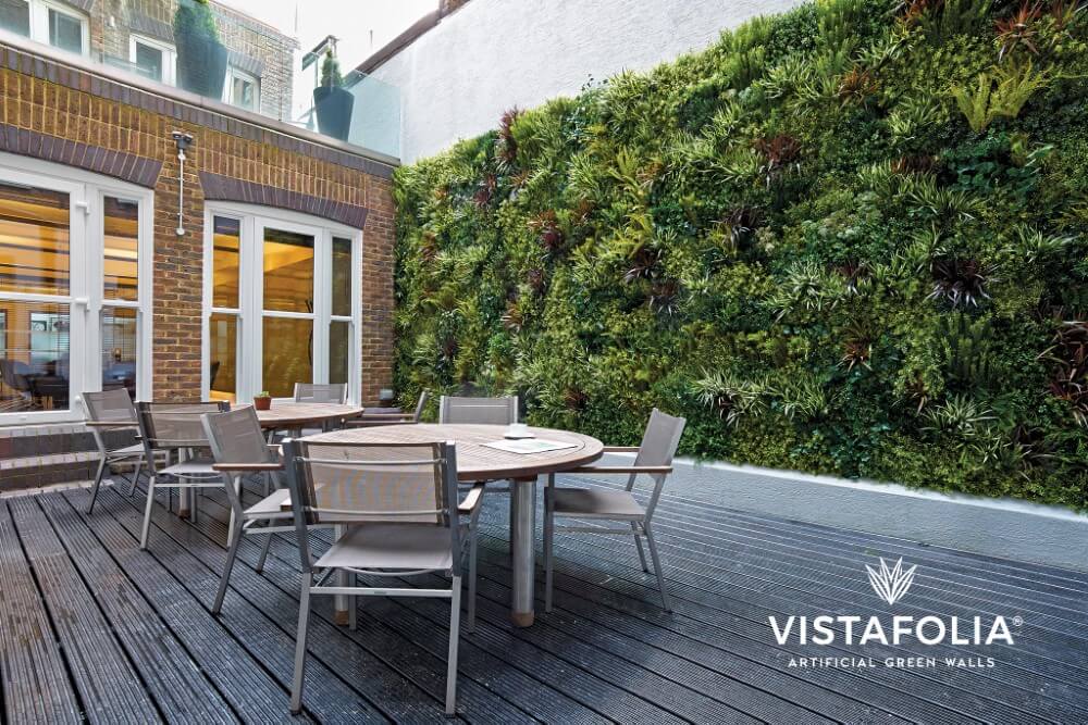 Cafe sitting area with artificial living wall